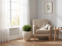 Large Embossed Stone Composite Planter - far away armchair scene, smaller pot